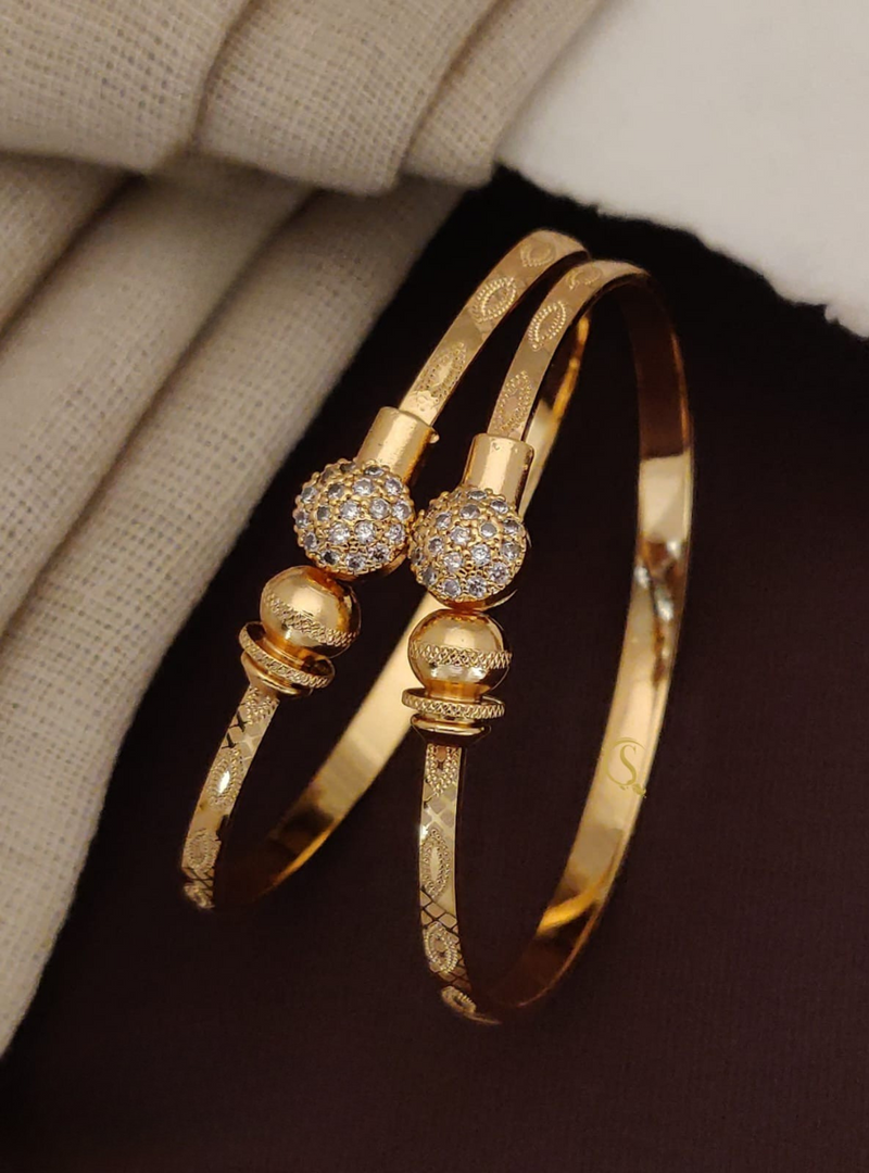 Regal Bloom Gold-Toned Bangles ๐