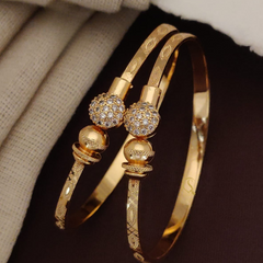 Regal Bloom Gold-Toned Bangles ๐