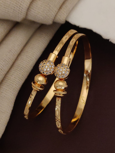 Regal Bloom Gold-Toned Bangles ๐